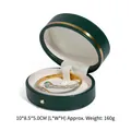 Snake-shaped gold bracelet with crystals in dark green PU leather round jewelry box - Dark Green Bracelet Box