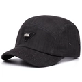 Classic black 5-panel camper cap with a triangular logo patch and metallic side eyelets - Adjustable / Black