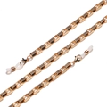 Close-up of golden metal eyeglass chain with textured square beads and white rubber loops - Block Texture Chain