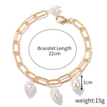 Baroque pearl bracelet in gold finish with rectangular links and 22cm length - Three Pearl Pendants
