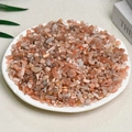 Natural orange rose quartz crushed stones in a white bowl for home decoration - Orange Sun (5-7mm) 100g