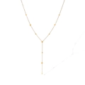 Detail view of a gold Y-shaped chain necklace with small teardrop pendants on white background - Gold Teardrop Style