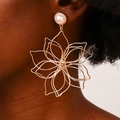 Elegant woven metal flower drop earrings with a pearl stud on a model's 45-degree profile - Gold - Pearl Stud Style
