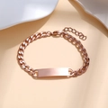 Detail of rose gold Cuban link bracelet with blank rectangular ID tag on stone background - Rose Gold with Extension Chain
