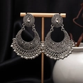 Detailed view of antique silver bohemian tassel earrings with intricate floral carvings - H4414 Antique Silver