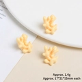 Detailed view of miniature resin ginger charms for DIY crafts and phone case decor - Ginger