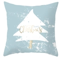 Detail of blue Christmas pillow cover with white tree silhouette and golden Merry Christmas text - Light Blue Christmas Tree Silhouette