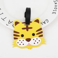 Yellow tiger-shaped silicone luggage tag with black strap for suitcase identification - Tiger