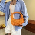 Borsa a mano arancione intrecciata con texture a corda e design estetico unico - Arancione