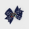 Détail du nœud à cheveux bleu foncé à pois avec tableau ABC et motif scolaire - Bleu marine