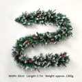 2.7m PE and PVC Christmas garland with frosted tips, pine cones and red berries - 2.7M White Sprayed Pine Cone Garland F