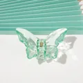 Detail of green butterfly hair claw clip with crystal texture and caustic shadows - Glass Butterfly - Transparent Green