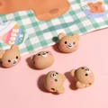 Detail view of five brown resin bear-shaped loose beads for DIY jewelry making crafts - Matte Rubber Bear (1 Piece)
