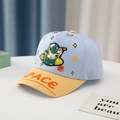Close-up of children's astronaut cap featuring colorful rocket patch and space print - 54cm (3-8 Years) / Light Blue