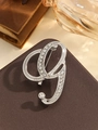 Elegant silver G-shaped brooch featuring sparkling rhinestones on textured leather - Silver Letter G