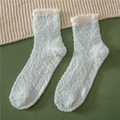 Detail of coral fleece non-slip socks with silicone grips and warm mint green texture - One Size / Spliced Light Green