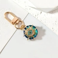 Blue and green crystal evil eye keychain with gold sun motif and sparkling rhinestones - Gold Rhombus Eye