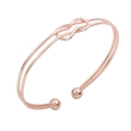 Rose gold adjustable cuff bracelet featuring a minimalist double line knot design - Knot Ball / Rose Gold
