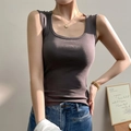 Slim fit dark grey knitted tank top with U-neck paired with classic blue jeans - Premium Grey