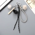 Portachiavi da baseball con mini mazza, guanto e palla su cordino intrecciato - Corda intrecciata + Ciondolo baseball / Nero