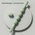 Muscle massage roller stick in avocado green for leg stretching and relaxation - 4 Wheels + Extra Massage Ball / Avocado Green