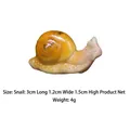 Miniature yellow resin snail garden ornament, sized 3cm x 1.2cm x 1.5cm for fairy gardens - Snail