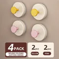 Set of 4 suction cup hooks in yellow and pink, featuring a foldable design for home storage - Set of 4 / Yellow+Pink