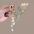Pince à cheveux muguet doré avec strass et de longs glands suspendus - 55# Nœud Muguet