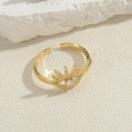 Golden geometric open ring with sunburst pattern and sparkling zircon stones on stone - Eye Sunburst Style / 14K Gold