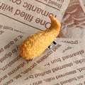 Realistic fried shrimp tempura hair clip with metal duckbill clip on vintage newspaper - Fried Chicken Wing