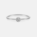 Macro shot of minimalist S925 silver ring with a round diamond in a bezel setting - US 6 / Silver Minimalist Solitaire