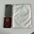 Detail of white nylon organizer bag with red stitching zipper and compact portable size - 30*23 / White