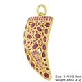 Macro detail of horn-shaped pendant with magenta zircons and gold-plated base finish - Gold Horn-Red Zirconia