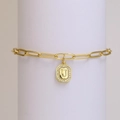 Gold paperclip chain bracelet with a sparkling octagonal pendant featuring the letter U - Letter U