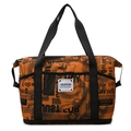 Orange canvas travel bag with vintage newspaper print and expandable wet-dry compartment - Brown Newspaper
