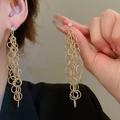 Close-up of golden leaf tassel earrings with pearls and long chain on model ear - 6# Silver Pin-Gold-Round