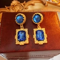 Vintage gold hoop earrings with deep blue gemstones on a brown leather jewelry box - Silver Earring Post Rhinestone Circle Square Earrings