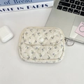 Detail of floral quilted mini pouch with metal ring zipper and snap button pocket - Beige Purple Flower
