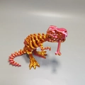 3D printed T-Rex skeleton toy in metallic pink to gold gradient finish on grey background - Large / Gold Rose Red