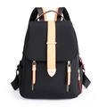 Sac à dos femme noir en tissu oxford avec détails en cuir beige et zips dorés - Noir