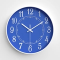Minimalist 12-inch round wall clock featuring a bright blue dial and white frame - Blue