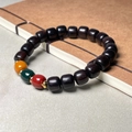 Ethnic style dark sandalwood bracelet with tricolor red, green, and yellow beads - African Blackwood 8x9mm Three-Color Old Bead