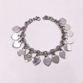 Silver stainless steel chunky chain bracelet with multiple heart-shaped pendants on white backdrop - Silver