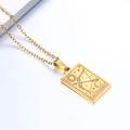 Detailed close-up of gold Sagittarius constellation pendant with sun and arrow engraving - Sagittarius / Gold