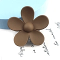 Detailed macro view of a large matte brown flower hair claw clip with five rounded petals - Large Flower Style / Coffee