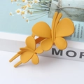 Matte yellow butterfly hair clip styled as an elegant oversized barrette for women - Yellow