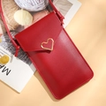 Crossbody phone wallet in red lychee grain faux leather with a golden heart clasp - Burgundy