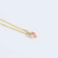 Elegant gold pendant necklace featuring a small delicate pink heart-shaped zircon stone - Gold Chain / Light Purple