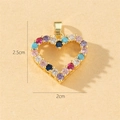 Macro detail of heart pendant with colorful cubic zirconia and 2.5cm by 2cm dimensions - D-Gold Multicolor Zircon