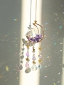 Golden moon suncatcher with purple amethyst stones and crystal prisms hanging on a white wall - Purple (More Crystals)